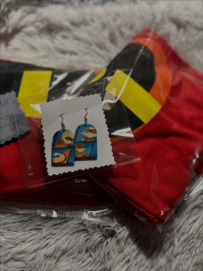Personalized glitter pens in green, red, gold, and blue with custom name wraps